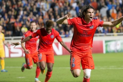 Paris Saint-Germain's striker Edinson Cavani (R) celebrates after scoring a goal during their UEFA Champions League group F football match against Apoel FC at GSP Stadium in the Cypriot capital Nicosia on October 21, 2014. AFP PHOTO /JACK GUEZ        (Photo credit should read JACK GUEZ/AFP/Getty Images)