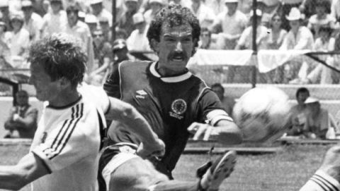 Scotland's Graeme Souness, centre, attempts to score a goal during the Football World Cup match against West Germany in Queretaro, Mexico on June 8, 1986. West German players Karl-Heinz Foerster, left, and Felix Magath attempt to stop the shot. West Germany defeated Scotland 2-1. (AP Photo)