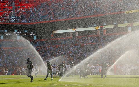 MIAMI GARDENS, FL - NOVEMBER 25:  Sprinklers on the field go off during a game between the Miami Dolphins and the Seattle Seahawks at Sun Life Stadium on November 25, 2012 in Miami Gardens, Florida.  (Photo by Mike Ehrmann/Getty Images)
