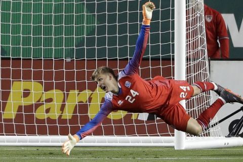 Iceland goalkeeper Runar Runarsson gives up a goal on a shot from Mexico's Miguel Layun during the second half of an international friendly soccer match Friday, March 23, 2018, in Santa Clara, Calif. (AP Photo/Marcio Jose Sanchez)