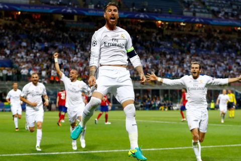 MILAN, ITALY - MAY 28:  Sergio Ramos of Real Madrid celebrates after scoiring the opening goal during the UEFA Champions League Final match between Real Madrid and Club Atletico de Madrid at Stadio Giuseppe Meazza on May 28, 2016 in Milan, Italy.  (Photo by Clive Rose/Getty Images)