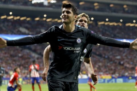 Chelsea's scorer Alvaro Morata, front, and his teammate Marcos Alonso, rear, celebrate their side's first goal during a Champions League group C soccer match between Atletico Madrid and Chelsea at the Wanda Metropolitano stadium in Madrid, Spain, Wednesday, Sept. 27, 2017. (AP Photo/Francisco Seco)