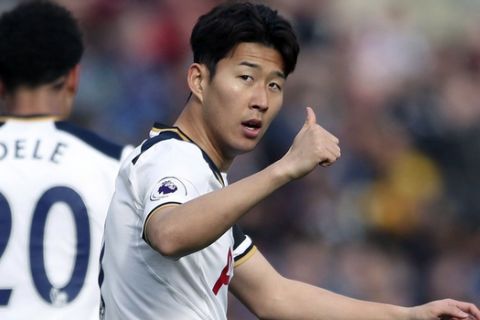 Tottenham Hotspur's Son Heung-Min gestures after scoring his side's second goal of the game, during the English Premier League soccer match between Burnley and Tottenham Hotspur, at Turf Moor, in Burnley, England,  Saturday April 1, 2017. (Nick Potts/PA via AP)