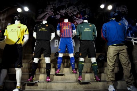 BARCELONA, SPAIN - MAY 17:  The new FC Barcelona shirt is displayed during the official presentation at Nou Camp Stadium on May 17, 2011 in Barcelona, Spain.  (Photo by David Ramos/Getty Images)
