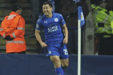 Leicester's Shinji Okazaki celebrates after scoring his side's first goal during the Champions League Group G soccer match between Leicester City and Club Brugge in Leicester, England, Tuesday, Nov. 22, 2015.(AP Photo/Rui Vieira))