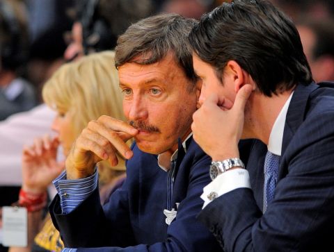 E. Stanley Kroenke, left, owner of the Denver Nuggets looks on during the second half in Game 7 in their first-round NBA basketball playoff series against the Los Angeles Lakers, Saturday, May 12, 2012, in Los Angeles. The Lakers won 96-87. (AP Photo/Mark J. Terrill) 