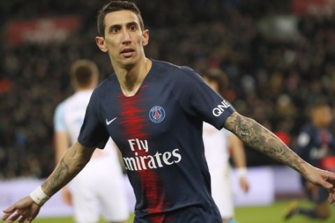 PSG's Angel Di Maria celebrates scoring his side's second goal during their French League One soccer match between Paris-Saint-Germain and Olympique Marseille at the Parc des Princes stadium in Paris, Sunday, March 17, 2019. (AP Photo/Christophe Ena)