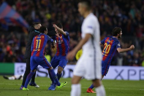 Barcelona's Neymar, Luis Suarez and Sergi Roberto celebrate with team mates at the end of the Champions League round of 16, second leg soccer match between FC Barcelona and Paris Saint Germain at the Camp Nou stadium in Barcelona, Spain, Wednesday March 8, 2017. Barcelona won the match 6-1 (6-5 on aggregate). (AP Photo/Manu Fernandez)