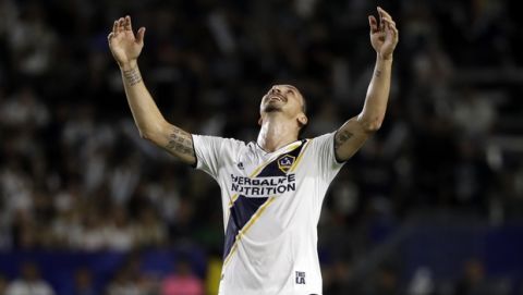 LA Galaxy forward Zlatan Ibrahimovic reacts to a missed shot during the first half of the team's MLS soccer match against the Minnesota United on Saturday, Aug. 11, 2018, in Carson, Calif. (AP Photo/Marcio Jose Sanchez)