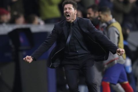 Atletico Madrid's head coach Diego Simone celebrates after Atletico Madrid's Alvaro Morata scoring the opening goal during the Champions League Group D soccer match between Atletico Madrid and Bayer Leverkusen at Wanda Metropolitano stadium in Madrid, Spain, Tuesday, Oct. 22, 2019. (AP Photo/Bernat Armangue)