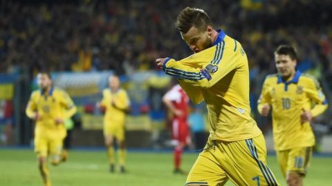 Ukraine's Andriy Yarmolenko (C) celebrates after scoring during the Group C Euro 2016 qualifying football match between Luxembourg and Ukraine at the Josy Barthel stadium in Luxembourg , November 15, 2014. AFP PHOTO/Emmanuel Dunand        (Photo credit should read EMMANUEL DUNAND/AFP/Getty Images)