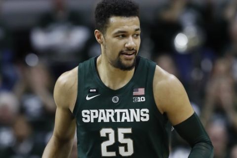 Michigan State forward Kenny Goins reacts after a basket during the first half of an NCAA college basketball game against Nebraska, Tuesday, March 5, 2019, in East Lansing, Mich. (AP Photo/Carlos Osorio)