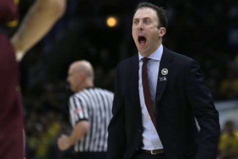 Minnesota head coach Richard Pitino yells during the first half of an NCAA college basketball game against Michigan in the semifinals of the Big Ten Conference tournament, Saturday, March 16, 2019, in Chicago. (AP Photo/Kiichiro Sato)
