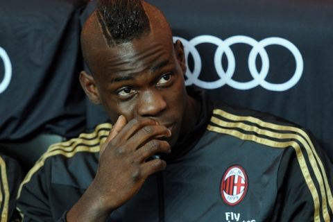 MILAN, ITALY - MAY 18:  Mario Balotelli of AC Milan looks on prior to the Serie A match between AC Milan and US Sassuolo Calcio at San Siro Stadium on May 18, 2014 in Milan, Italy.  (Photo by Claudio Villa/Getty Images)