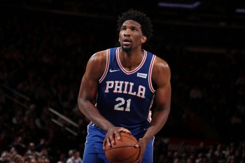 NEW YORK, NY - MARCH 15:  Joel Embiid #21 of the Philadelphia 76ers shoots a free throw during the game against the New York Knicks on March 15, 2018 at Madison Square Garden in New York City, New York.  NOTE TO USER: User expressly acknowledges and agrees that, by downloading and or using this photograph, User is consenting to the terms and conditions of the Getty Images License Agreement. Mandatory Copyright Notice: Copyright 2018 NBAE  (Photo by Nathaniel S. Butler/NBAE via Getty Images)
