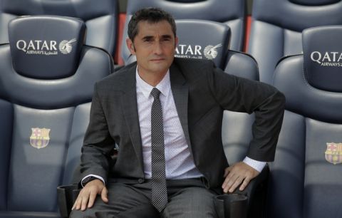 FC Barcelona's new signing coach Ernesto Valverde poses to the media during his official presentation at the Camp Nou stadium in Barcelona, Spain, Thursday, June 1, 2017. Former player Valverde was hired as the new coach, the club confirmed on Monday. (AP Photo/Manu Fernandez)