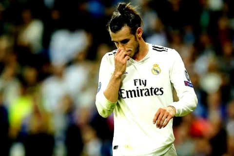 Real's Gareth Bale gestures during the Champions League, group G, soccer match between Real Madrid and Viktoria Plzen at the Santiago Bernabeu stadium in Madrid, Spain, Tuesday Oct. 23, 2018. (AP Photo/Paul White)