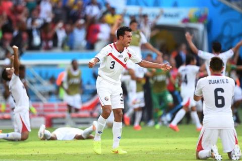 RECIFE, BRAZIL - JUNE 20: Giancarlo Gonzalez of Costa Rica celebrates after defeating Italy 1-0 during the 2014 FIFA World Cup Brazil Group D match between Italy and Costa Rica at Arena Pernambuco on June 20, 2014 in Recife, Brazil.  (Photo by Laurence Griffiths/Getty Images)