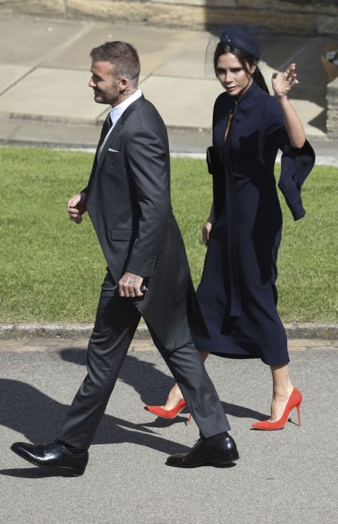 David and Victoria Beckham arrive for the wedding ceremony of Prince Harry and Meghan Markle at St. George's Chapel in Windsor Castle in Windsor, near London, England, Saturday, May 19, 2018. (Andrew Milligan/pool photo via AP)