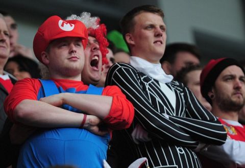 ROTHERHAM, ENGLAND - APRIL 27:  Fans of Rotherham United show their colours during the npower League Two match between Rotherham United and Aldershot Town at New York Stadium on April 27, 2013 in Rotherham, England.  (Photo by Jamie McDonald/Getty Images)
