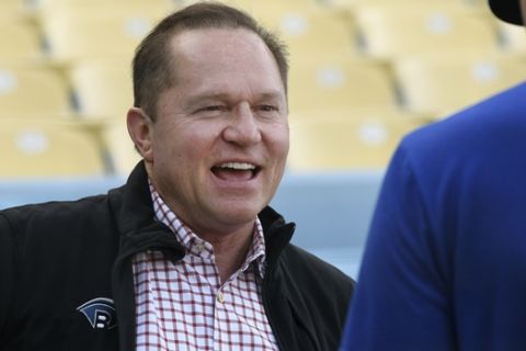 Sports agent Scott Boras attends batting practice before a baseball game between the Los Angeles Dodgers and Oakland Athletics, Tuesday, April 10, 2018, in Los Angeles. (AP Photo/Michael Owen Baker)