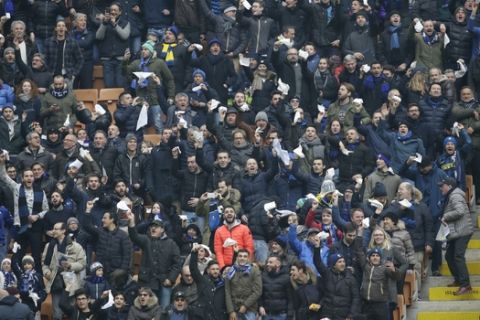 Inter Milan's fans wait for the start of the Italian Serie A soccer match between Inter Milan and Empoli at the San Siro stadium, in Milan, Italy, Sunday, Feb.12, 2017. (AP Photo/Luca Bruno)