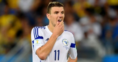 CUIABA, BRAZIL - JUNE 21:  Edin Dzeko of Bosnia and Herzegovina looks dejected after a 1-0 defeat in the 2014 FIFA World Cup Group F match between Nigeria and Bosnia-Herzegovina at Arena Pantanal on June 21, 2014 in Cuiaba, Brazil.  (Photo by Stu Forster/Getty Images)