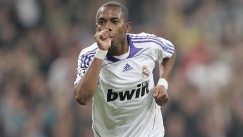 Real Madrid player Robinho, from Brazil, celebrates after scoring his second goal against Olympiakos  during their Champions League Group C soccer match at Santiago Bernabeu Stadium in Madrid, Wednesday Oct. 24 2007 (AP Photo/Bernat Armangue)