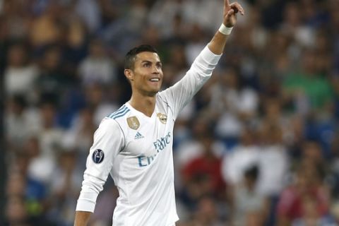 Real Madrid's Cristiano Ronaldo celebrates scoring his side's 2nd goal during a Champions League group H soccer match between Real Madrid and Apoel Nicosia at the Santiago Bernabeu stadium in Madrid, Spain, Wednesday, Sept. 13, 2017. (AP Photo/Francisco Seco)