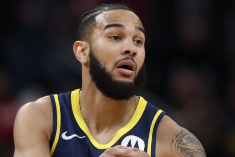 Indiana Pacers guard Cory Joseph brings the ball up court during the second half of an NBA basketball game, Wednesday, April 3, 2019, in Detroit. (AP Photo/Carlos Osorio)