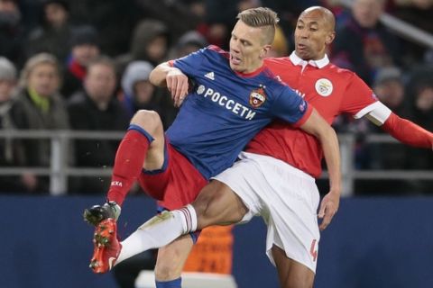 CSKA's Pontus Wernbloom, left, challenges for the ball with Benfica's Luisao during the Champions League Group A soccer match between CSKA Moscow and Benfica in Moscow, Russia, Wednesday, Nov. 22, 2017. (AP Photo/Ivan Sekretarev)