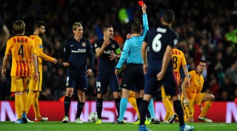 "BARCELONA, SPAIN - APRIL 05:  Fernando Torres of Atletico Madrid (9) is shown a red card by referee Felix Brych and is sent off during the UEFA Champions League quarter final first leg match between FC Barcelona and Club Atletico de Madrid at Camp Nou on April 5, 2016 in Barcelona, Spain.  (Photo by David Ramos/Getty Images)"
