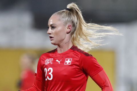 Switzerland's Alisha Lehmann controls the ball during the Women's World Cup 2023 Group G qualifying soccer match between Lithuania and Switzerland at LFF stadium in Vilnius, Tuesday, Nov. 30, 2021. (AP Photo/Mindaugas Kulbis)