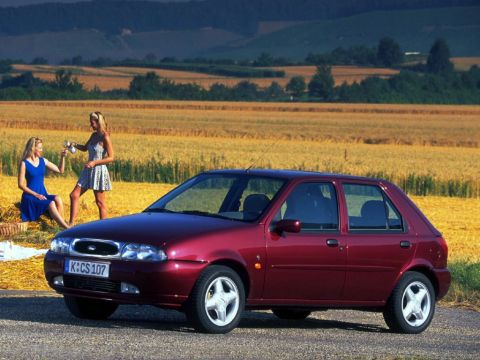 Ford Fiesta Ghia Hatchback 5dr viewed from the Front in a Scenic setting