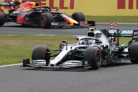 Mercedes driver Valtteri Bottas of Finland steers his car during the second practice session for the Japanese Formula One Grand Prix at Suzuka Circuit in Suzuka, central Japan, Friday, Oct. 11, 2019. (AP Photo/Toru Takahashi)