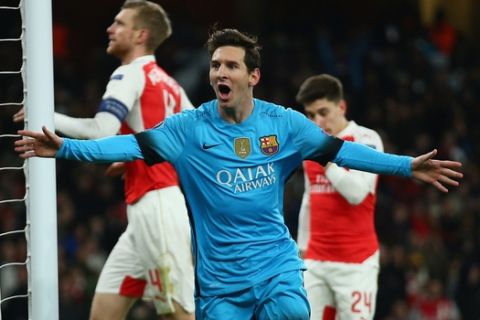LONDON, ENGLAND - FEBRUARY 23: Lionel Messi of Barcelona celebrates scoring the opening goal during the UEFA Champions League round of 16 first leg match between Arsenal and Barcelona on February 23, 2016 in London, United Kingdom.  (Photo by Paul Gilham/Getty Images)