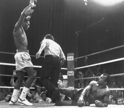 American Matthew Saad Muhammad, left, raises his arm after knocking down Britain's John Conteh in the 14th round of their World Boxing Council Light Heavyweight title fight, in Atlantic City, N.J., Aug. 19, 1979. Muhammad retained his title on a points decision. (AP Photo)