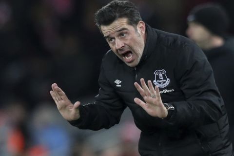 Everton's manager Marco Silva gives instructions to his players during the English Premier League soccer match between Liverpool and Everton at Anfield Stadium, Liverpool, England, Wednesday, Dec. 4, 2019. (AP Photo/Jon Super)