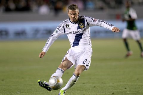 CARSON, CA - APRIL 14:  David Beckham #23 of the Los Angeles Galaxy shoots a nd scores a goal in the second half against the Portland Timbers at The Home Depot Center on April 14, 2012 in Carson, California.  The Galaxy won 3-1.  (Photo by Stephen Dunn/Getty Images)