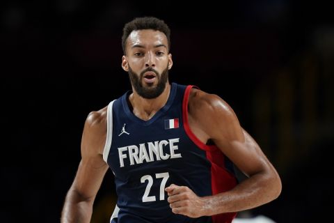 France's Rudy Gobert (27) runs up court during men's basketball gold medal game against the United States at the 2020 Summer Olympics, Saturday, Aug. 7, 2021, in Saitama, Japan. (AP Photo/Eric Gay)