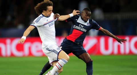 PARIS, FRANCE - APRIL 02:  David Luiz of Chelsea and Blaise Matuidi of PSG compete for the ball during the UEFA Champions League quarter final, first leg match between Paris Saint Germain and Chelsea at Parc des Princes on April 2, 2014 in Paris, France.  (Photo by Shaun Botterill/Getty Images)
