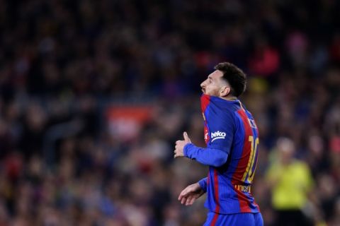 FC Barcelona's Lionel Messi reacts during the Spanish La Liga soccer match between FC Barcelona and Valencia at the Camp Nou stadium in Barcelona, Spain, Sunday, March 19, 2017. (AP Photo/Manu Fernandez)