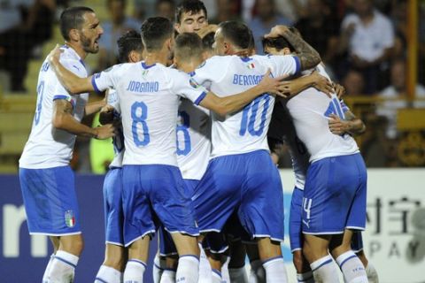 Italy players celebrate after Italy's Andrea Belotti scored his side's opening goal during the Euro 2020 group J qualifying soccer match between Armenia and Italy at the Vazgen Sargsyan Republican stadium in Yerevan, Armenia, Thursday, Sept. 5, 2019. (AP Photo/Hakob Berberyan)