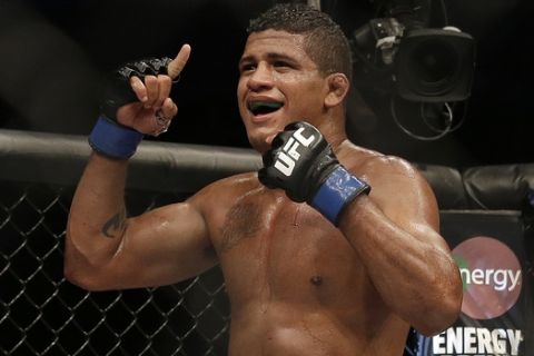 Gilbert Burns celebrates after beating Andreas Stahl by unanimous decision in a welterweight mixed martial arts bout at a UFC on Fox event in San Jose, Calif., Saturday, July 26, 2014. (AP Photo/Jeff Chiu)
