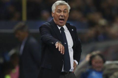 Napoli head coach Carlo Ancelotti gives instructions during a Champions League group E soccer match between Genk and Napoli at the KRC Genk Arena in Genk, Belgium, Wednesday, Oct. 2, 2019. (AP Photo/Francisco Seco)