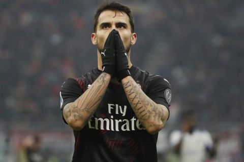 AC Milan's Suso reacts after missing a scoring chance during the Serie A soccer match between AC Milan and Sampdoria at the San Siro stadium, in Milan, Italy, Monday, Jan. 6, 2020. (AP Photo/Antonio Calanni)