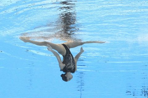Evangelia Platanioti, of Greece, competes in the women's solo technical final of artistic swimming at the World Aquatics Championships in Doha, Qatar, Saturday, Feb. 3, 2024. (AP Photo/Lee Jin-man)