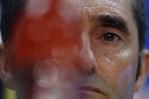 Barcelona coach Ernesto Valverde listens to a question during a press conference in Barcelona, Spain, Monday Sept. 17, 2018. Barcelona will play PSV Eindhoven in a Group B Champions League soccer match on Tuesday. (AP Photo/Manu Fernandez)
