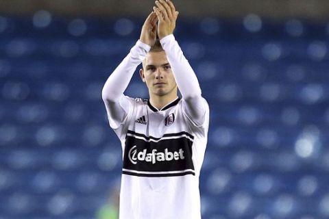Fulham's Harvey Elliott applauds the fans at full time after the game against Millwall during the third round English League Cup soccer match at The New Den in London, Tuesday Sept. 25, 2018. Elliott has become the youngest-ever player to feature for Fulham at 15-years and 174 days old. (Steven Paston/PA via AP)