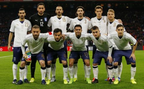 Italy's team poses prior the international friendly soccer match between The Netherlands and Italy at the Amsterdam ArenA stadium, Netherlands, Tuesday, March 28, 2017. (AP Photo/Peter Dejong)